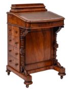 A Victorian walnut Davenport,