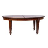 A mahogany extending dining table, in Regency style,