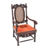 A Charles II walnut and canework elbow chair,