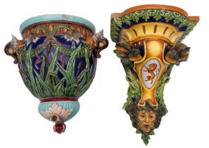 A Pesaro [Molaroni] majolica wall bracket and matched cistern, the former modelled with foliage,