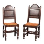 A matched pair of late 17th-century oak Cheshire single chairs;