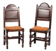 A matched pair of late 17th-century oak Cheshire single chairs;