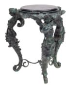 A verdigris patinated metal and marble mounted gueridon in the manner of a tripod Athenienne,
