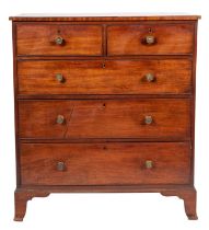 A George IV mahogany rectangular chest, the top with an ebony strung edge,