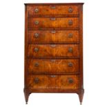 An early 19th-century French mahogany and inlaid upright chest of drawers;