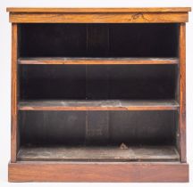 An early 19th-century rosewood open bookcase; with a rectangular top and plinth base; 90cm high,