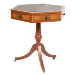 A walnut and inlaid hexagonal occasional table, in Regency style,
