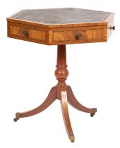 A walnut and inlaid hexagonal occasional table, in Regency style,