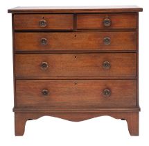A late Regency mahogany and inlaid apprenticeman's chest of drawers;