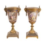 A pair of late 19th century gilt-metal and 'Sevres' porcelain mounted cassollette bases with