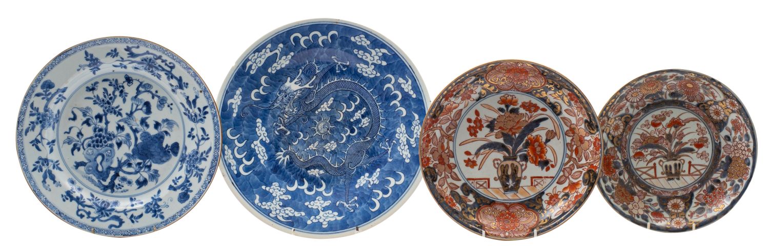 Two Japanese Imari dishes and two Chinese blue and white dishes the first two painted in