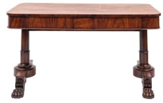 A Victorian rosewood rectangular library table; the top with rounded corners,