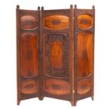 An Indian carved teak threefold screen; with aised and incised panels of flowers and foliage,