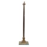 A brass columnar standard lamp,
