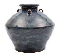 A Chinese stoneware jar of squat oviform with short raised neck and three small lug handles,