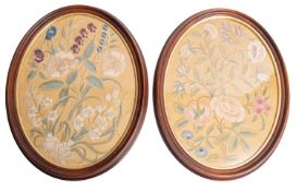 A pair of oval silkwork pictures of floral sprays, 19th century and later mounted,