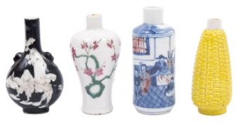 A group of four Chinese snuff bottles/miniature vases the first painted in copper-red and blue with