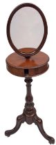A Victorian mahogany shaving stand, with an adjustable oval plate,