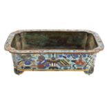 A Chinese cloisonne jardiniere of shaped rectangular form with ruyi feet,