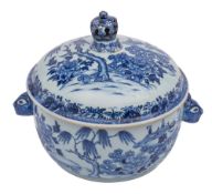 A Chinese export blue and white circular tureen and cover with coronet finial and animal mask head