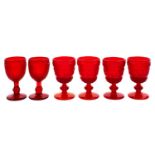 A mixed group of red and cranberry glass, including wine glasses [some moulded], glass coolers,