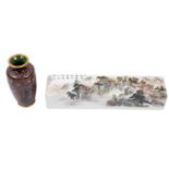 A Chinese porcelain scroll weight and a small Japanese cloisonne vase the weight decorated with