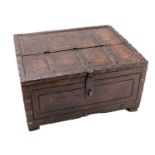 A Northern European carved hardwood and iron bound table box,