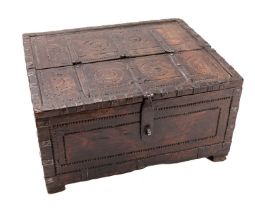 A Northern European carved hardwood and iron bound table box,