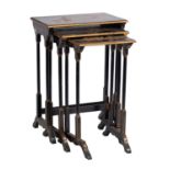 A nest of three rectangular black lacquer and chinoiserie occasional tables in the Oriental style;