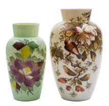 Two Continental opaque glass vases of pale green hue one enamelled with a songbird amongst blooms