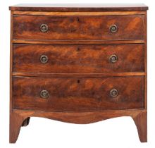 A mahogany bow-front chest of drawers in the Georgian manner,