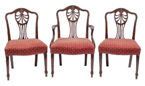 A set of six mahogany dining chairs in George III Hepplewhite style, circa 1900,: by S & H Jewell,