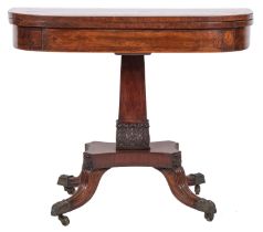 A Regency mahogany and inlaid card table of D-shaped outline; bordered with boxwood and ebony lines,