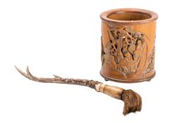 A Chinese carved bamboo brush pot together with an antler and bone mounted brush the brush pot