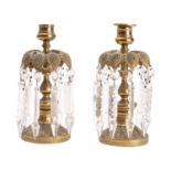 A pair of Regency gilt metal and glass hung lustre candlesticks,