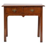 A walnut rectangular side table, 18th Century and later, the top with a moulded edge,