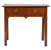 A walnut rectangular side table, 18th Century and later, the top with a moulded edge,