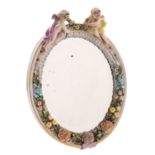 A Continental porcelain easel mirror in the Meissen manner,