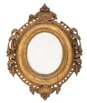 A carved small giltwood and gesso oval mirror,