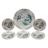 A Chinese famille rose charger and five matching plates with shaped rims,