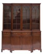 A mahogany & glazed breakfront bookcase in George III style,