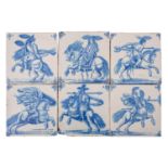 Six Dutch delft tiles, each painted in blue with a mounted cavalry soldier brandishing a sword,