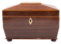 A Regency rosewood tea caddy, circa 1815; of sarcophagus form, with sycamore stringing throughout,