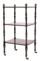 An early 19th-century rosewood three-tier rectangular whatnot; with turned finials, turned uprights,