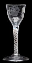 An opaque twist wine glass of Jacobite interest the ogee bowl engraved with an open rose,