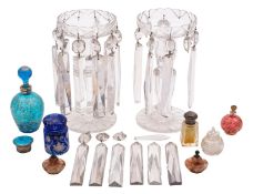 A mixed lot of glassware including a pair of clear glass table lustres on star cut bases,