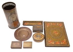 A Kashmiri decorated lacquer and papier mache desk blotter case, a similar pen tray and two boxes,