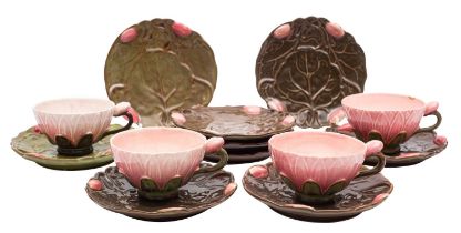 A group of Zsolnay Pecs majolica 'lotus' tea wares comprising four cups and nine saucers,