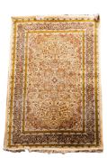 A Nain part silk rug, the ivory cartouche field with a central powder blue cartouche pole medallion,