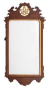 A mahogany fretwork wall mirror in George III style,